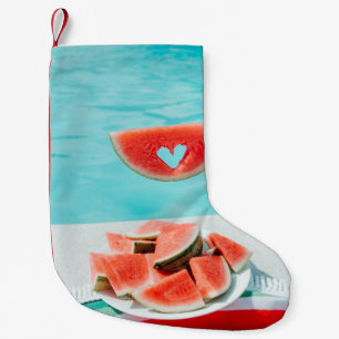 Petite Chaussette De Noël pastèque tranchée sur papier blanc