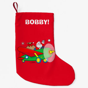 Petite Chaussette De Noël Père Noël pilotant l'avion avec le nom de cadeaux
