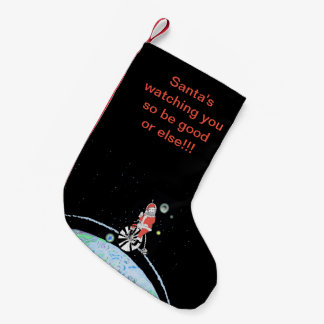Petite Chaussette De Noël Père Noël vous observant de l'espace