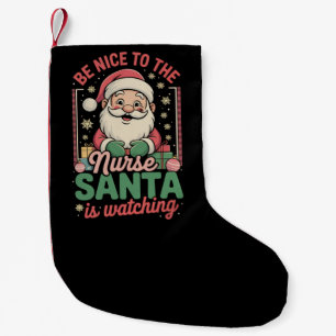 Petite Chaussette De Noël Soyez gentil avec l'infirmière, le Père Noël regar