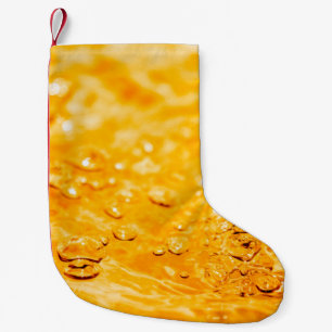 Petite Chaussette De Noël Surface propre liquide ondulée d'eau