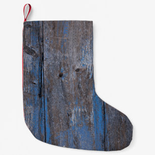 Petite Chaussette De Noël Vieux arrière - plan en bois. Grunge textureabstra