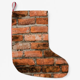 Petite Chaussette De Noël Vieux et vintage mur de brique rouge texture arriè