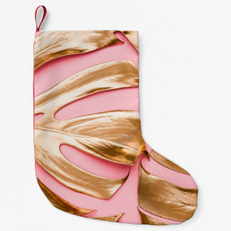 Petite Chaussette De Noël Vue rapprochée de l'or naturel peint monstère trop