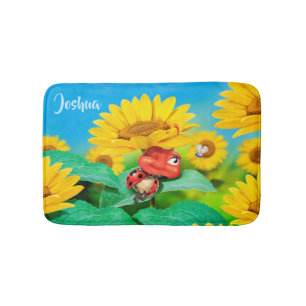 Petite coccinelle de tournesols de tapis de bain