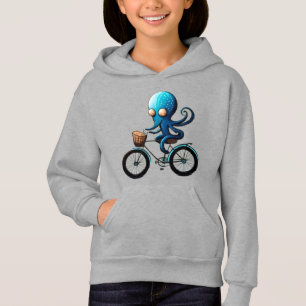 Petite pieuvre bleue mignonne à vélo