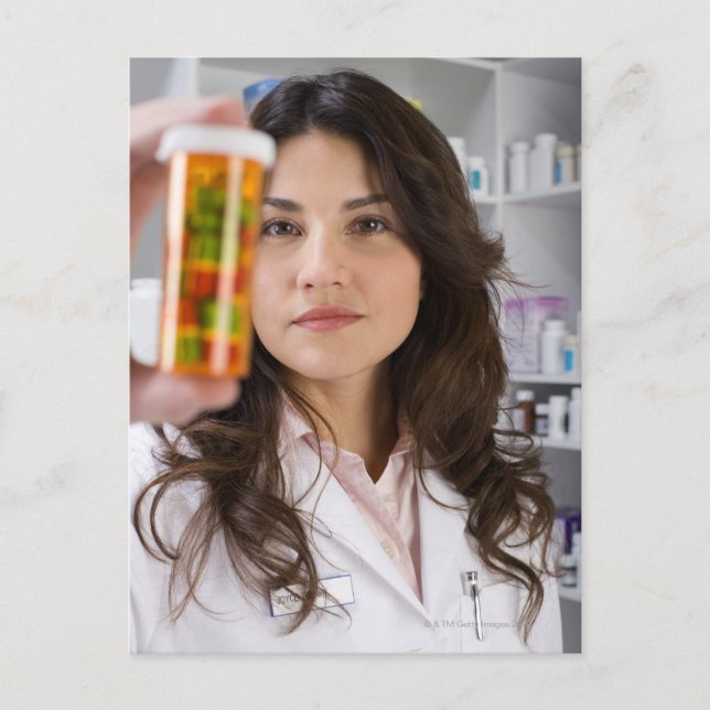 Pharmacist holding a pill bottle postcard (Front)