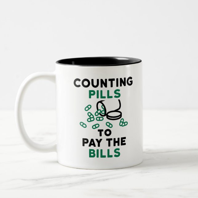 Pharmacy Tech Counting Pills to Pay the Bills Two-Tone Coffee Mug (Left)