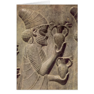 Phoenician carrying two offering, detail relief