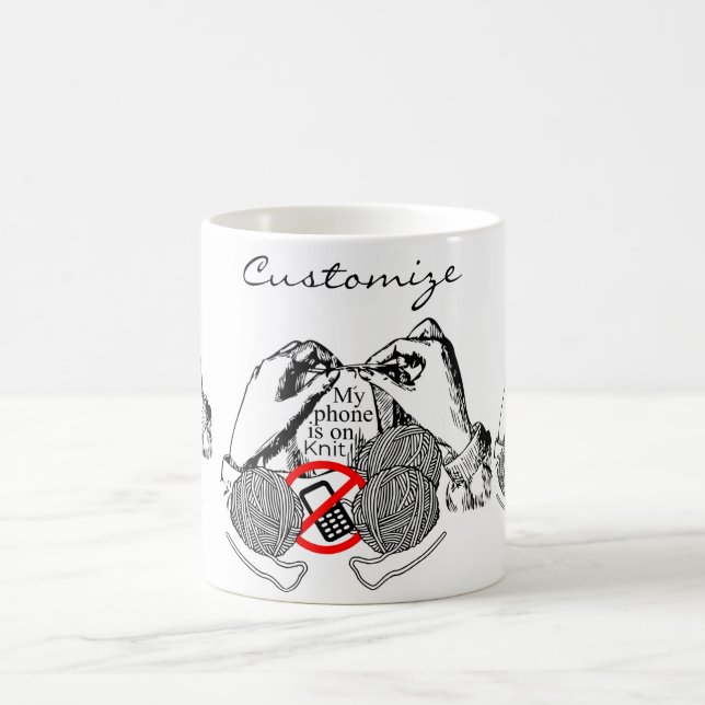 Phone is on Knit Thunder_Cove Coffee Mug (Center)