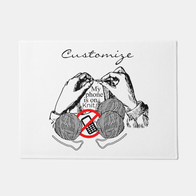 Phone is on Knit Thunder_Cove Doormat (Front)