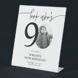 Photo 90th Birthday Welcome Sign | Look Who's 90<br><div class="desc">Welcome guests to your 90th birthday celebration with this stunning editable welcome sign. Featuring a sleek, customizable layout, this template allows you to easily add your own photo and personalize the text, making it a perfect addition to your milestone 90th birthday decor. Ideal for entryways or as a party focal...</div>