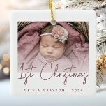 Photo Baby's First Christmas Rose Script Ceramic Ceramic Ornament<br><div class="desc">Celebrate baby's first Christmas with this modern minimalist photo keepsake ornament. The dusty rose text reads "1st Christmas" in trendy handwriting script. Easily replace the sample image with your favourite photo,  and add baby's name and the year below. A white gradient screen helps make the text overlay pop.</div>