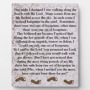 Photo Empreintes dans le sable avec la Plaque Jésus