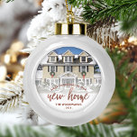 Photo First Christmas New Home Rose Gold Script Ceramic Ball Christmas Ornament<br><div class="desc">Commemorate your first Christmas in your new home with this beautiful modern keepsake ornament. The text reads "First Christmas in our new home, " with the words "new home" in elegant rose gold faux foil script. Replace the sample image with a photo of your new house and add your family's...</div>