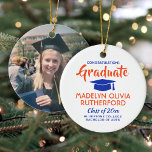 Photo Graduation Congrats Orange and Blue Ceramic Ornament<br><div class="desc">Commemorate the graduate's achievement with a custom photo orange, blue and white round graduation Christmas ornament. Picture and all text are simple to customize. Include school name and degree, congratulations, thanks mom and dad, or other message of your choice. Design features a white background, blue graduation cap, personalized modern typography...</div>