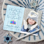 Photo Hanukkah Menorah Peace Love Light Rustic Holiday Card<br><div class="desc">“Peace, love & light.” A playful, modern, artsy illustration of boho pattern candles in a menorah helps you usher in the holiday of Hanukkah, along with the custom photo of your choice. Assorted blue candles with colourful faux foil patterns overlay a light blue rustic wood background. Faux gold foil confetti...</div>