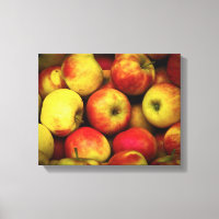Photo of a Bushel Of Yellow and Red Apples