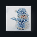 Photo of a Cute Snowman in Winter - Christmas 2 Inch Square Button<br><div class="desc">Button with a cute photograph of a little snowman. Standing outside in the winter with snow falling all around. This cute little guy is dressed up in blue knitted hat and scarf.</div>