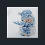 Photo of a Cute Snowman in Winter - Christmas 2 Inch Square Button<br><div class="desc">Button with a cute photograph of a little snowman. Standing outside in the winter with snow falling all around. This cute little guy is dressed up in blue knitted hat and scarf.</div>