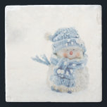 Photo of a Cute Snowman in Winter - Christmas Stone Coaster<br><div class="desc">A stone coaster with a cute photograph of a little snowman. Standing outside in the winter with snow falling all around. This cute little guy is dressed up in blue knitted hat and scarf.</div>