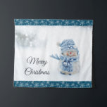 Photo of a Cute Snowman in Winter - Christmas Tapestry<br><div class="desc">Tapestry with a cute photograph of a little snowman. Standing outside in the winter with snow falling all around. This cute little guy is dressed up in blue knitted hat and scarf.</div>