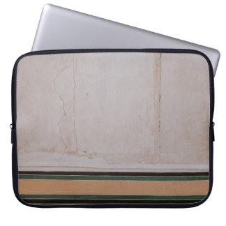 Photo of brown concrete pavement laptop sleeve