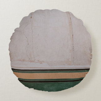 Photo of brown concrete pavement round pillow