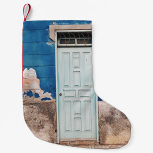 PHOTO OF BUILDING WITH WHITE WOODEN DOOR SMALL CHRISTMAS STOCKING