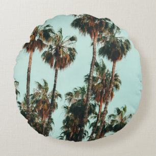 Photo of green palm trees round pillow