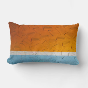 Photo of orange, white, and blue artwork lumbar pillow