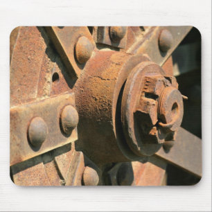 Photo of rusty old tractor wheel hub and axle mouse pad