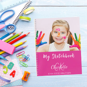 Photographie de carnet de croquis monogramme rose 