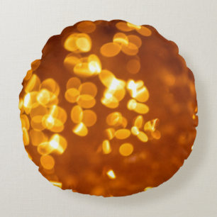 Photography of red and orange light round pillow