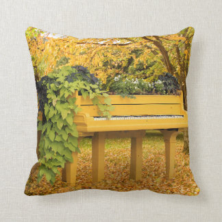 Piano in autumn woods throw pillow