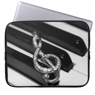 Piano with g-clef laptop sleeve