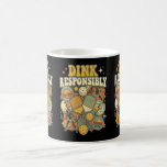 Pickleball Dink Responsibly Paddle Player Coffee Mug<br><div class="desc">This funny retro pickleball design features a bootleg 70s vintage design with pickleball paddles,  balls,  and the hilarious phrase “Dink Responsibly.” Perfect for pickleball players who love classic retro style,  this groovy coffee mug or tea cup makes a great gift for pickleball fans,  league players,  and weekend court warriors.</div>