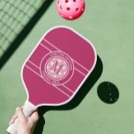 Pickleball Ninja Custom Name Initial Girly Pink Pickleball Paddle<br><div class="desc">Classic design features two lines of customizable text for "Pickleball Ninja" or custom saying of choice and name or custom text in a timeless modern font arched over & under an image of a pickleball in pink on a colourful pink background. Add one or two intials in the centre of...</div>