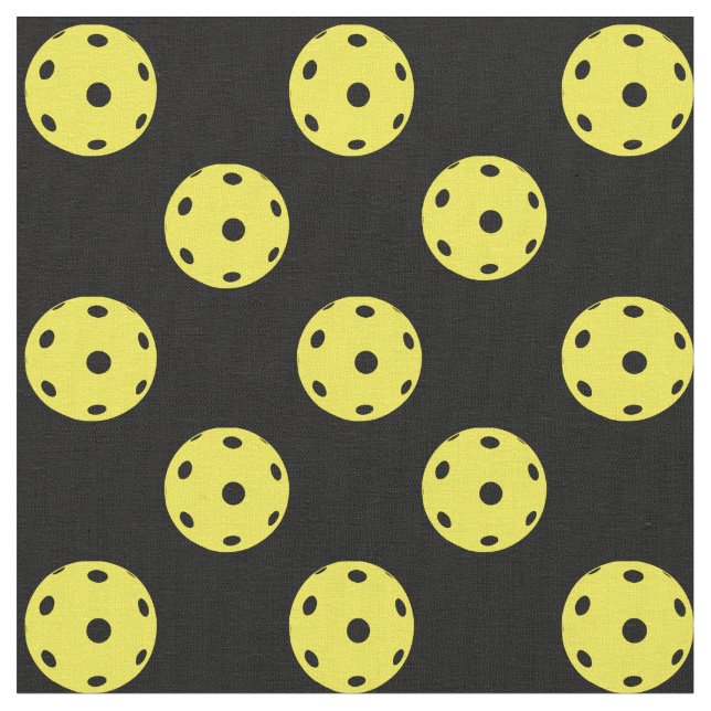 Pickleballs on black background fabric (Close Up)