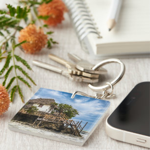 Picturesque house on a tropical coral outcrop keychain