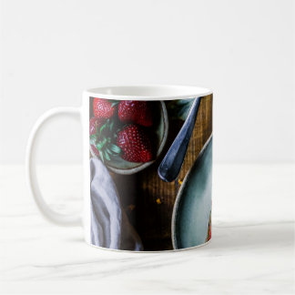 PIECE OF CAKE SERVED ON ROUND GRAY CERAMIC PLATE COFFEE MUG