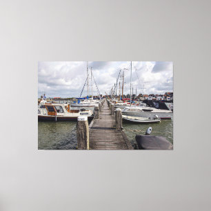 Pier with boats and yachts in Marken Netherlands Canvas Print