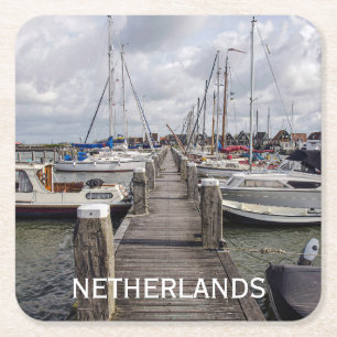 Pier with boats and yachts in Marken Netherlands Square Paper Coaster