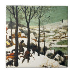 Pieter Bruegel Hunters in the Snow Tile<br><div class="desc">Pieter Bruegel Hunters in the Snow tile. Oil painting on wood from 1565. Pieter Bruegel the Elder was one of the great painters of the Northern Renaissance. Hunters in the Snow is one of the artist’s most famous paintings. The work features hunters and their hunting dogs moving over a hill...</div>