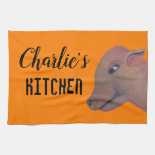 pig on orange kitchen towel