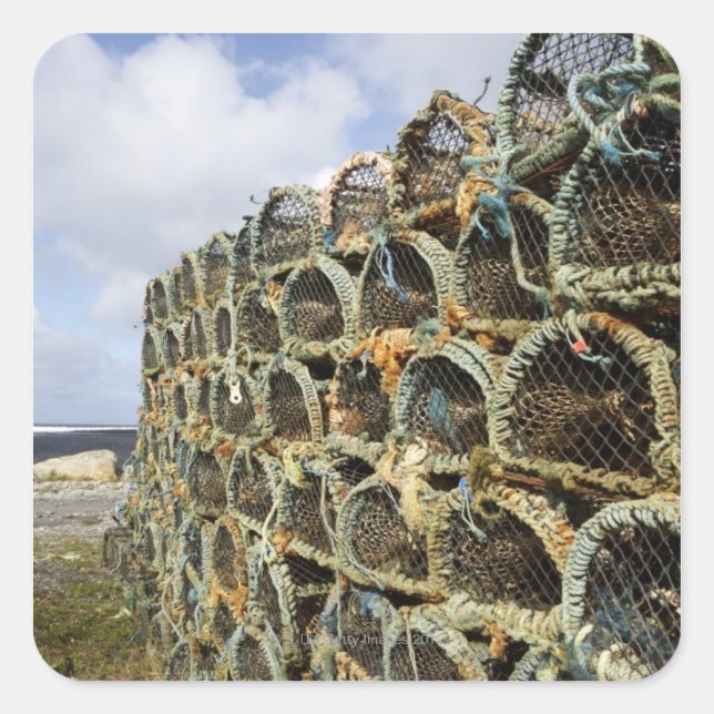 pile of lobster crab pots on Irish shoreline Square Sticker (Front)