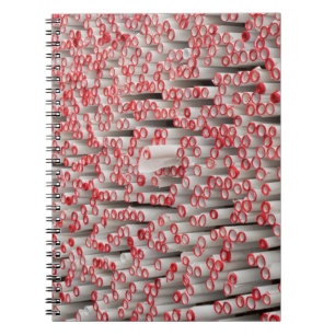 Pile of rolled papers notebook