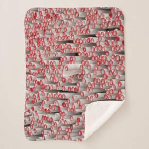 Pile of rolled papers sherpa blanket