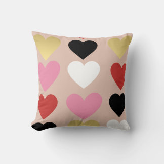 Pillow with stylish and colourful hearts.