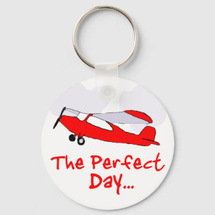 pilot flyling red airplane keychain